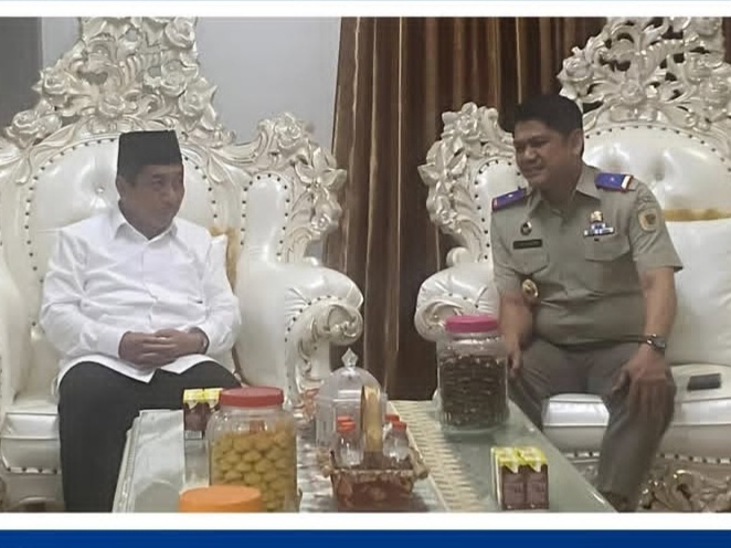 Kakanwil BPN Sulteng, M Tansrih bersama Kakanwil Kementerian Agama Provinsi Sulawesi Tengah.