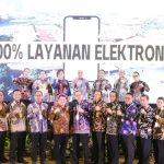 Seluruh jajaran Kanwil BPN Jawa Timur dan para kepala kantor berfoto bersama dalam Rapat Monitoring dan Evaluasi PTSL yang digelar di Hotel Harris, Malang.